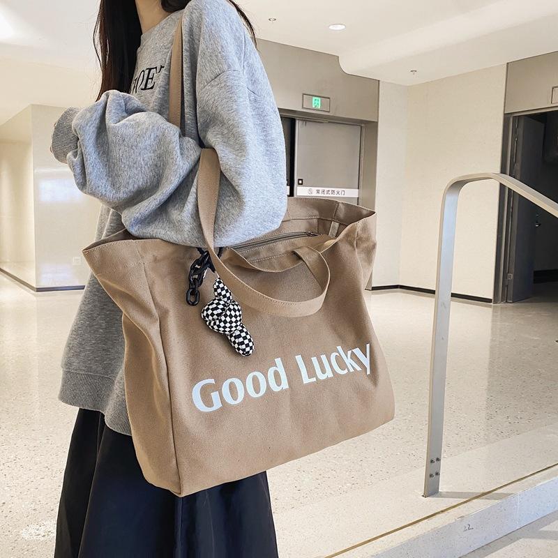 Large Capacity Custom Logo Single Shoulder Canvas Bag Artistic Style Hand-held Shopping Bag