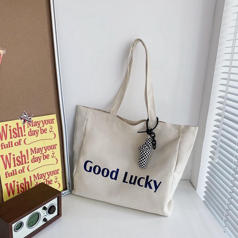 Large Capacity Custom Logo Single Shoulder Canvas Bag Artistic Style Hand-held Shopping Bag