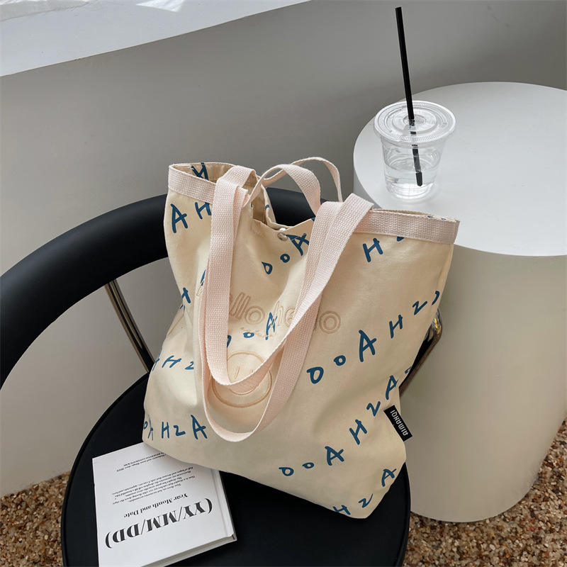 Manufacturer Custom Smiley Face Embroidery Monogram Single Shoulder Bag Large Capacity Cotton Canvas Bag