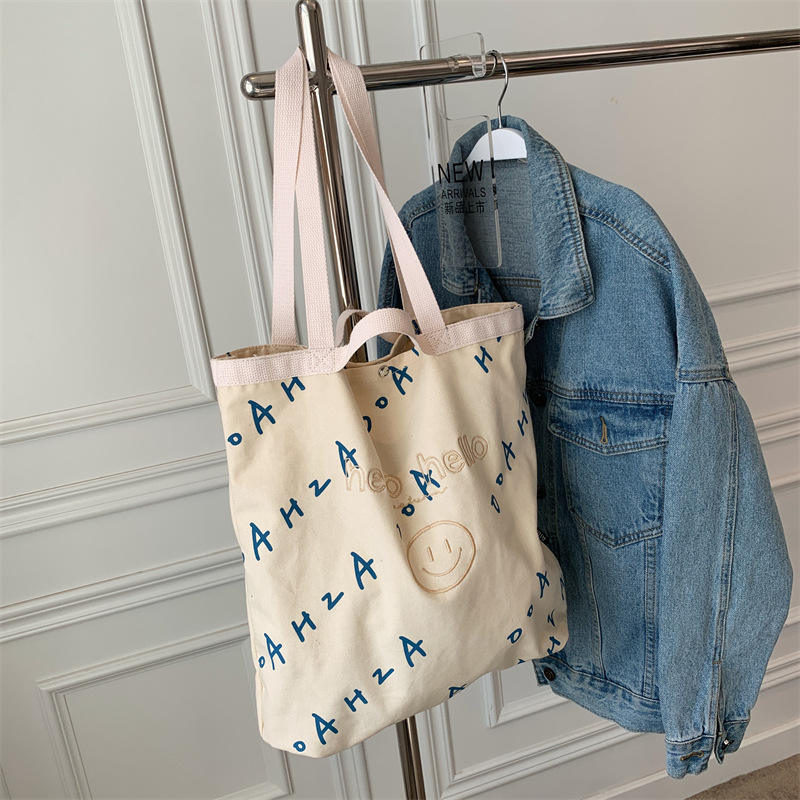 Manufacturer Custom Smiley Face Embroidery Monogram Single Shoulder Bag Large Capacity Cotton Canvas Bag