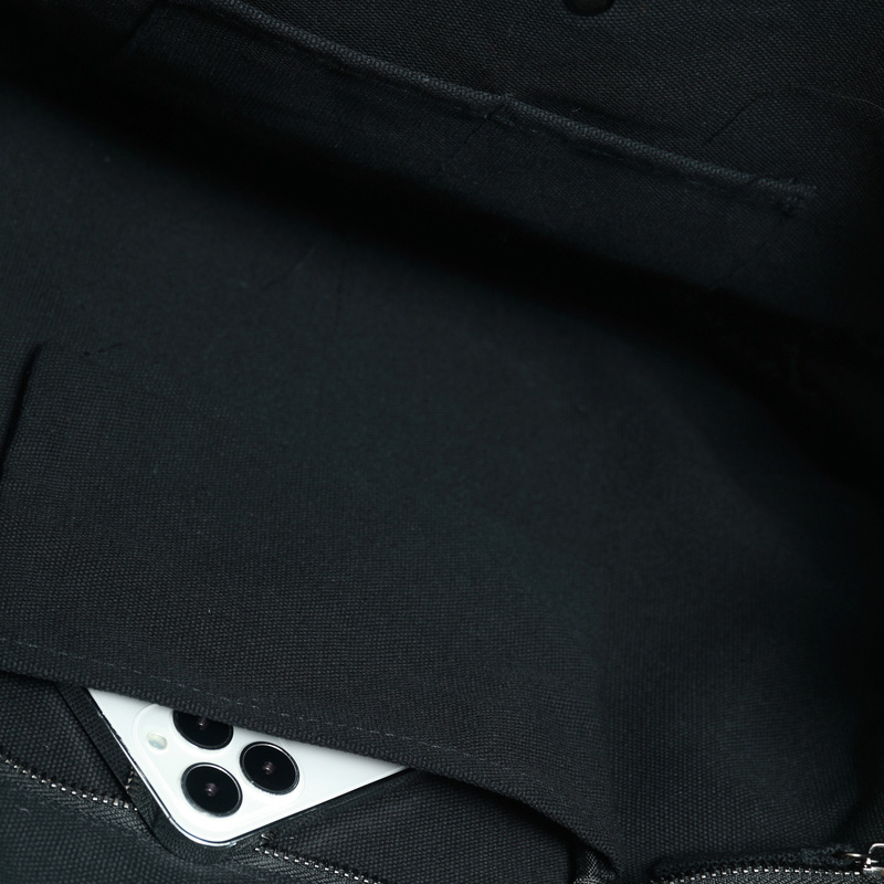 Black canvas bag with bottom and side panel