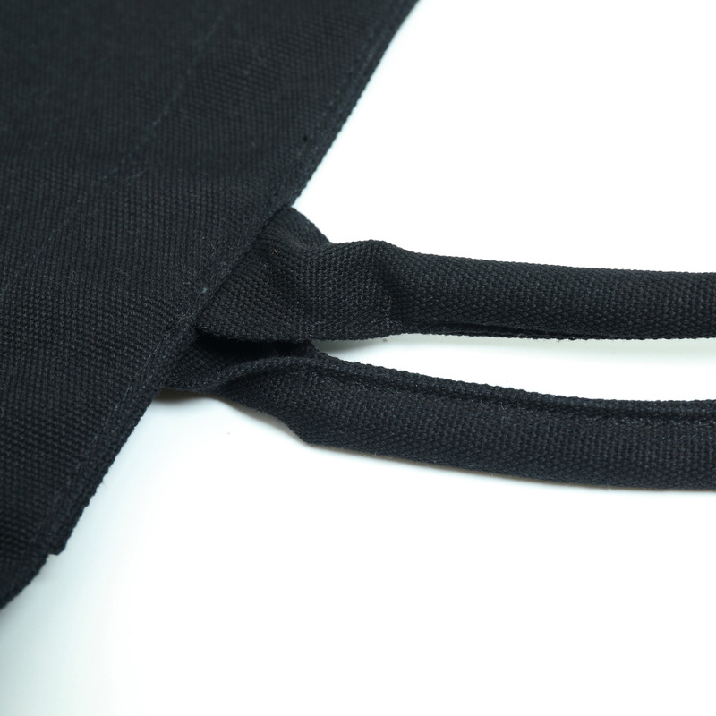 Black canvas bag with bottom and side panel