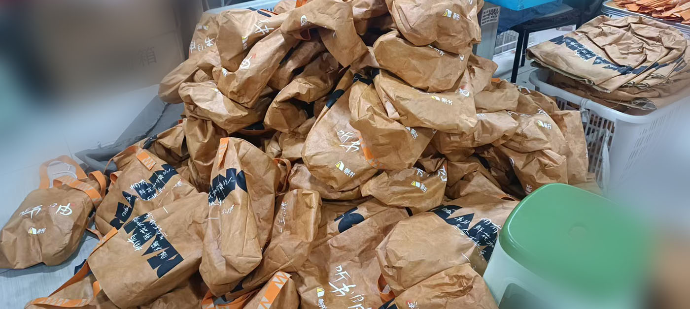 FanBook Customized 15,000 Dupont Paper Bags for Member Recharge Activity