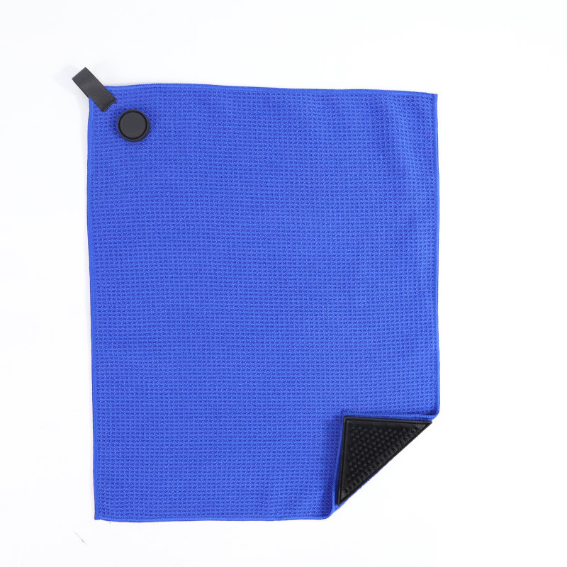 Towel with brush