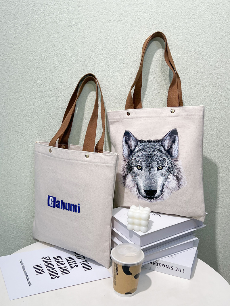 Canvas bag with bottom and side pockets