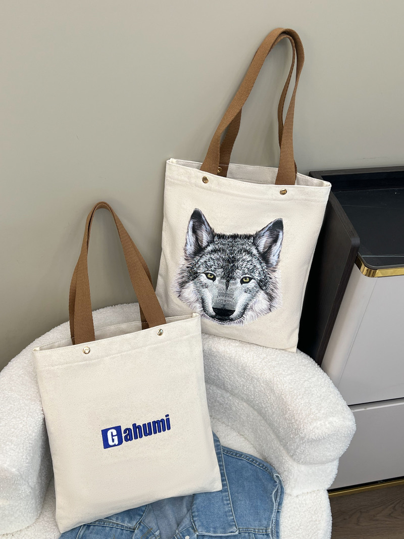 Canvas bag with bottom and side pockets
